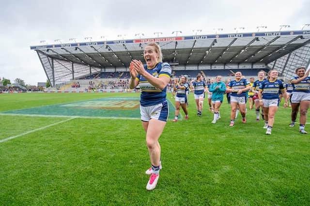 Amy Hardcastle leads the celebrations after Rhinos beat Wigan to book a trip to Wembley. Picture by Allan McKenzie/SWpix.com.