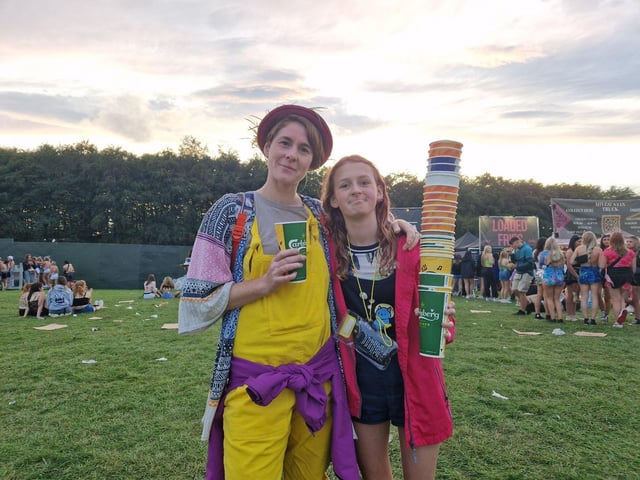 Su Taylor with Lola Nuttall, 13, who had already made £36.50 already from collecting cups and was trying to make £50.