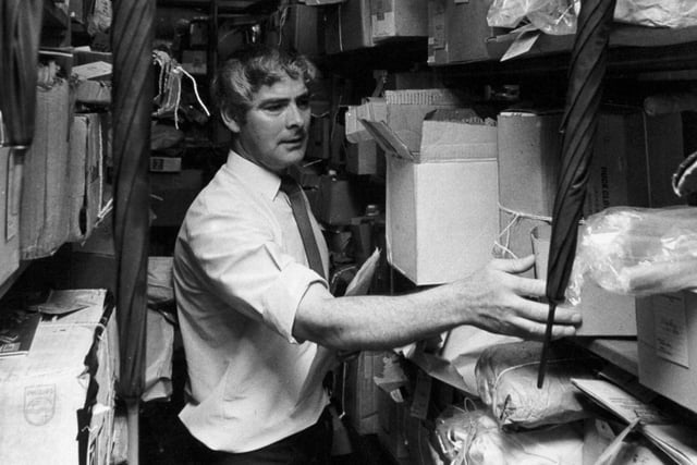 The Aladdin's Cave of the Post Office - Clarence Bateman among the racks and racks of lost property at Quebec Street in July 1973.