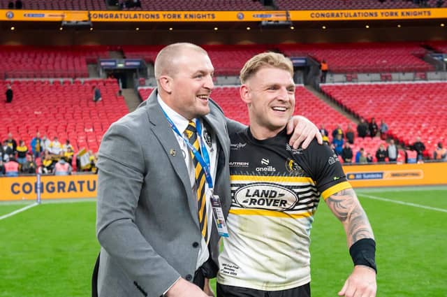 York Knights coach Mark Applegarth celebrates with man of the match Liam Harris following the 1895 Cup final win against Featherstone Rovers. Picture by Allan McKenzie/SWpix.com.