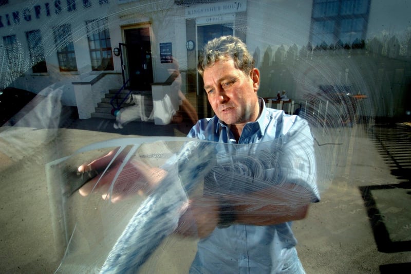 This is Terry 'Turbo' Burrows, the fastest window cleaner in the world, showing off his skills at the Kingfisher Windows open day in May 2005.