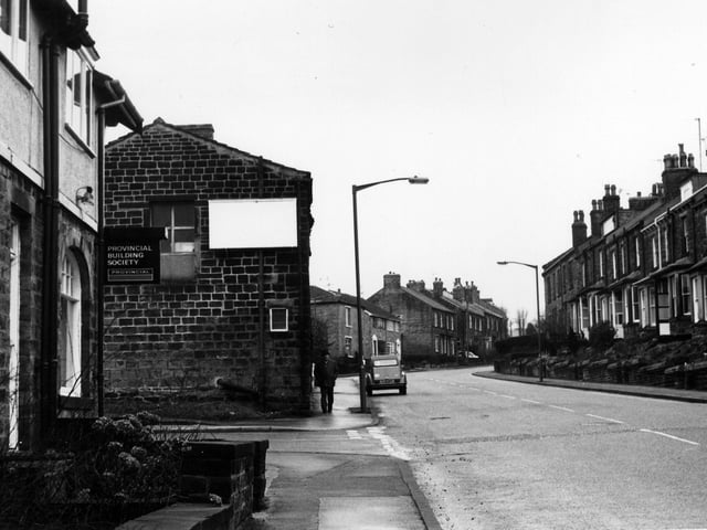 Looking up Woodhall Road in February 1984. On the left is Brian Fleming Estate Agents, the local agents for the National & Provincial Building Society. The junction with Rushton Street follows.