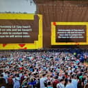 A message appeared on the screen at the Main Stage West after Lil Tjay failed to turn up for his set (Photo by National World)