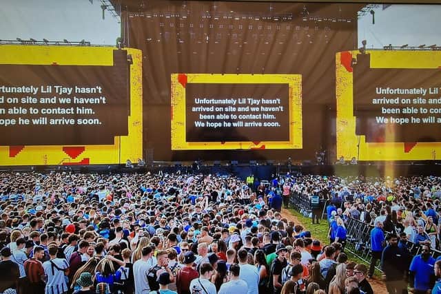 A message appeared on the screen at the Main Stage West after Lil Tjay failed to turn up for his set (Photo by National World)
