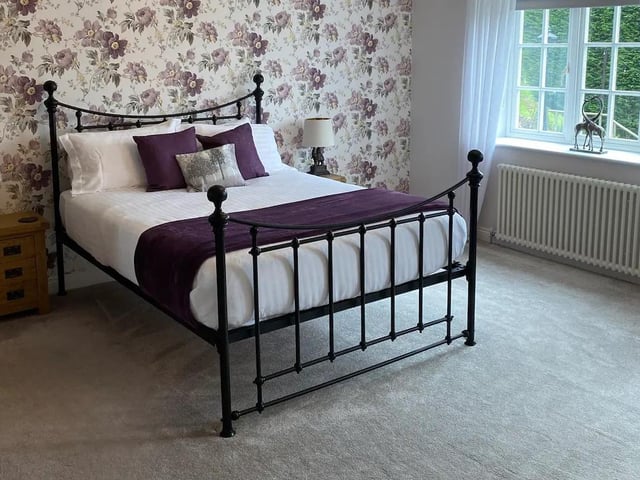 This bedroom is incredibly spacious.