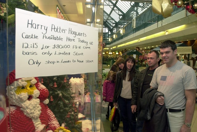 A queue forms at Toymaster shop in the Headrow Centre, in Leeds city centre, which is selling the only Harry Potter Hogwarts Castle Lego kit, in Leeds, which is the Christmas hit with children, in 2001.