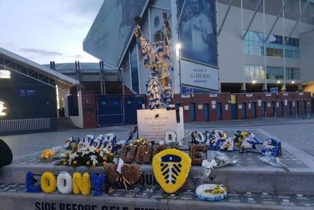 Tributes left to Gary at the Billy Bremner statue after his wake, which was held at Elland Road.