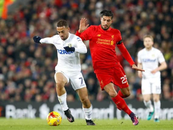 Kemar Roofe takes on Emre Can at Anfield