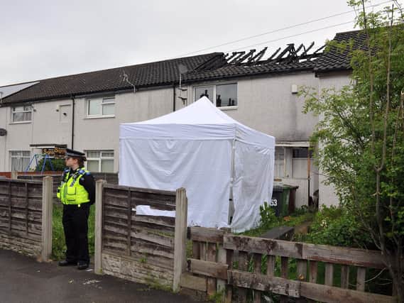 Police at the scene of the fatal house fire in Harehills. Picture: Tony Johnson