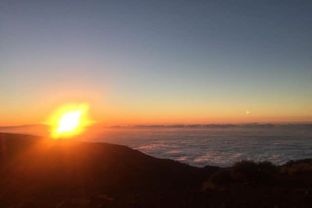 The stunning sunset above the clouds on Mount Teide.