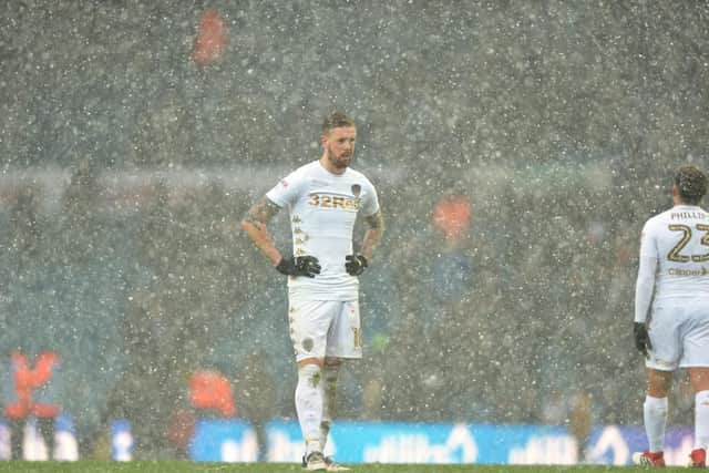 NOT AGAIN: Leeds United centre-back Pontus Jansson shows his obvious frustration as the snow falls in the aftermath of Saturday's 2-1 loss at home to Sheffield Wednesday.