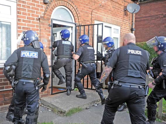 Police raid flats in St Wilfrids Avenue, Harehills, as part of an operation to tackle the dealing of spice in the city. Pictures: Tony Johnson