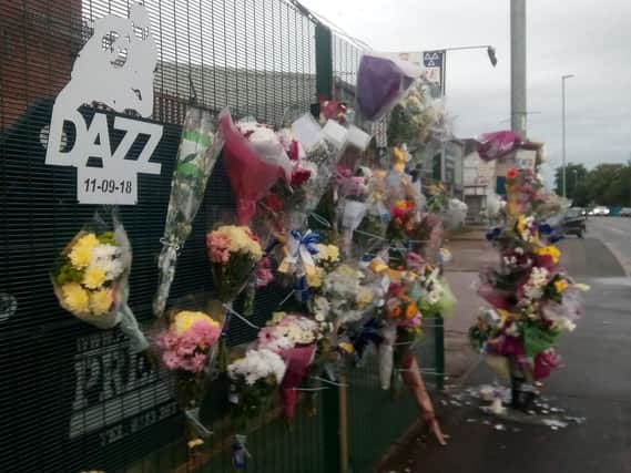Tributes left to Darren Butterworth at the scene of the crash
