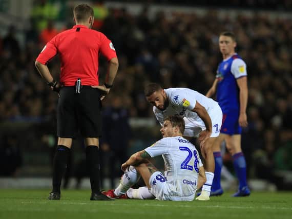 Leeds United defender Gaetano Berardi picks up a hamstring injury against Ipswich Town.