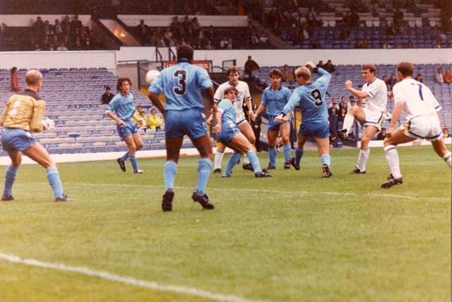 We kick off with pre-season action from the West Riding Senior Cup group match at Elland Road. Mike Whitlow drives the ball towards keeper Jonathan Gould.
