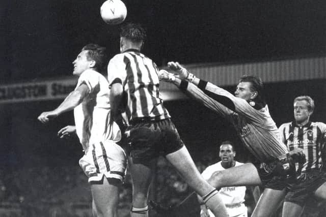 Goalkeeper  Paul Musselwhite races out in an attempt to thwart Lee Chapman during the League Cup round 2 first leg tie.
