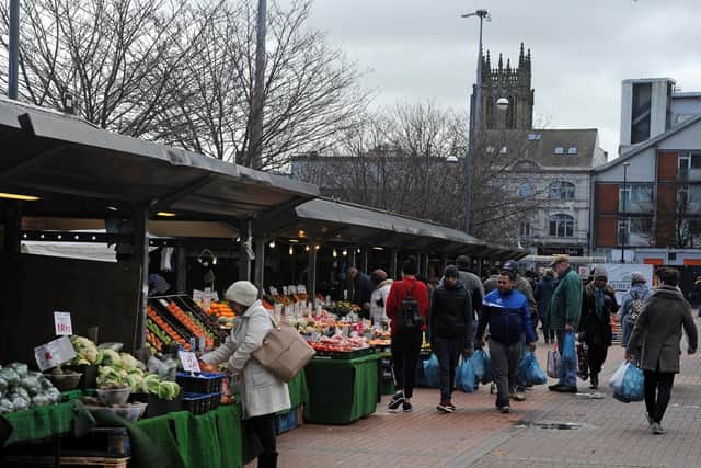 Shoppers at the Leeds Kirkgate outdoor market.