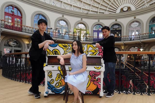 Three international young scholars  Aliya Alsafa, with Shuheng Zhang and Jasper Heyman from the Lang Lang International Music Foundation Piano Day 2019 play at the Leeds Corn Exchange.  Pianists play pop-up performances on the Leeds Piano Trail, hosted in venues throughout the city centre.