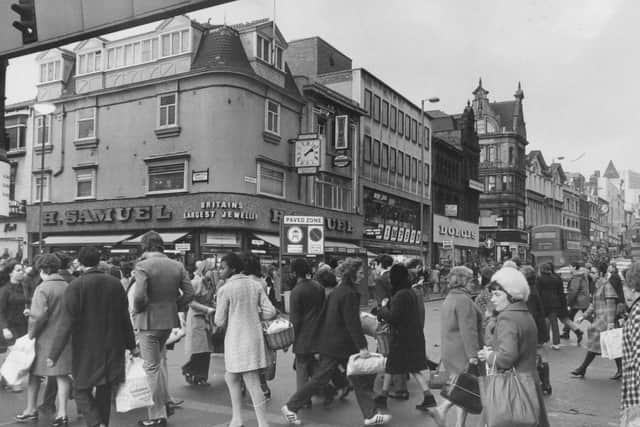 A busy pedestrian crossing in the run up to Christmas.