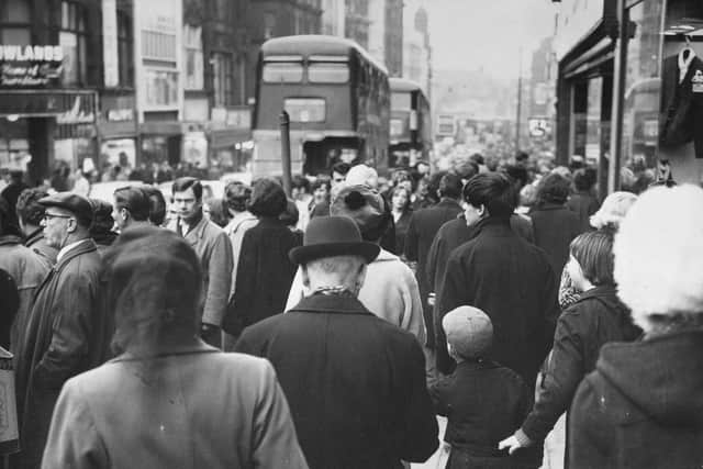 Briggate is packed with slowly moving Christmas shoppers.