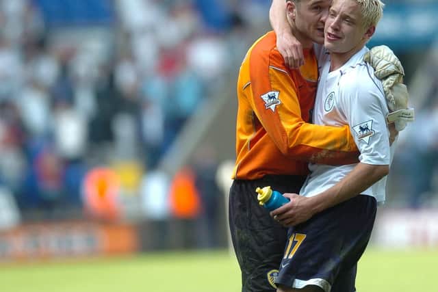 The last to leave was a tearful Alan Smith, pictured here with goalkeeper Paul Robinson.