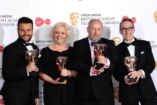 Mark Catley, second from right at the 2019 BAFTA awards with his trophy for Best Soap and Continuing Drama - Eastenders