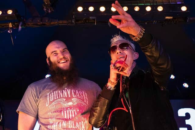 Ben Slack, 29, joining his favourite band Alabama 3 on stage.