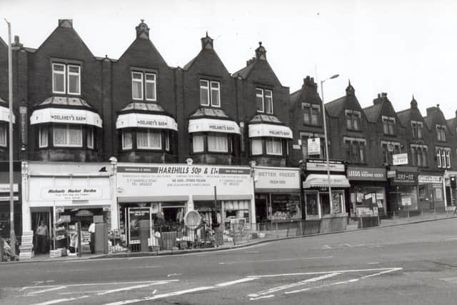 Harehills Road with the now shut Delaney's Bar above the parade of shops.