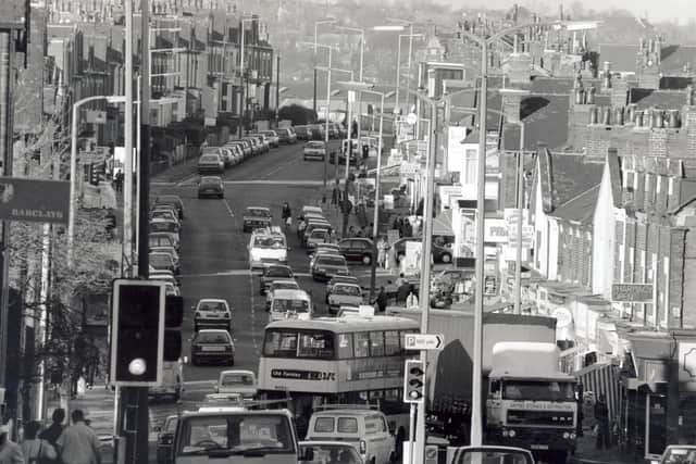 A bustling Harehills Lane.