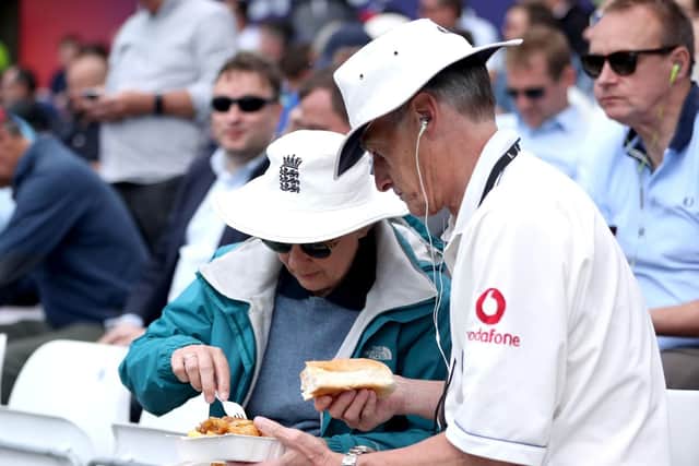 England fans share some food.
