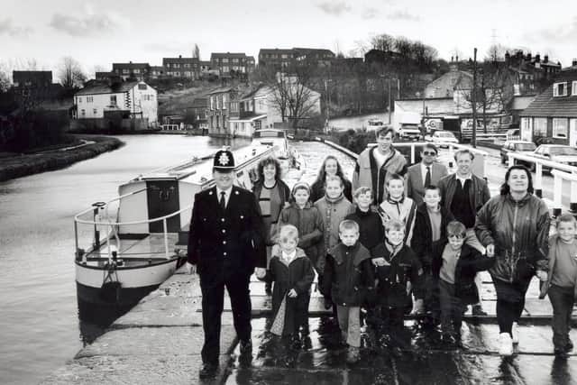A community constable and young people joined forces - to arrest the decline of a stretch of canal at Rodley. PC Dave Norman and youngsters from Rodley Youth Project cleaned up a section of  the Leeds Liverpool Canal towpath.