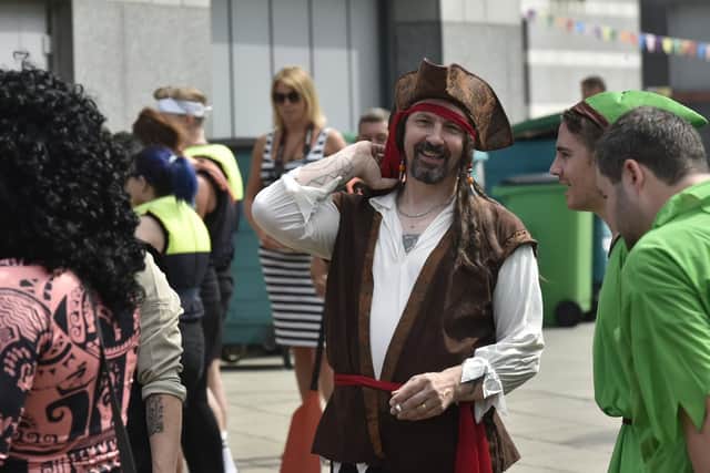 Participants are encouraged to don fancy dress for the boat races.