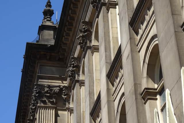 Detail of the stone capitals carved by Catherine Mawer on Leeds Town Hall.