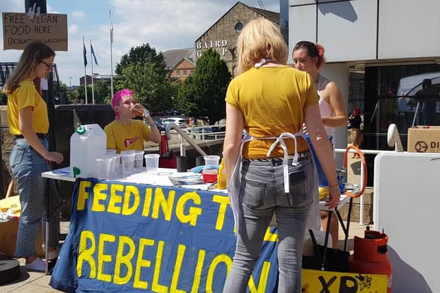 Extinction Rebellion 'youth' protesters offered water and free vegan food to protesters.