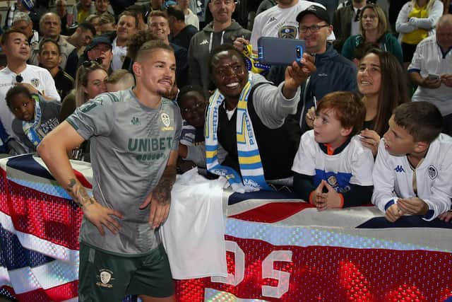 Kalvin Phillips and the rest of his Leeds United team-mates spent time with fans following the session - posing for photos and handing out free shirts.