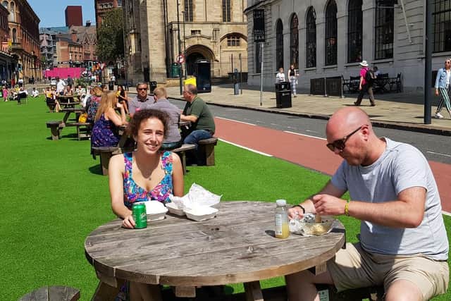 25-year-old Bella Quirin enjoying the sunshine near Leeds Art Gallery.