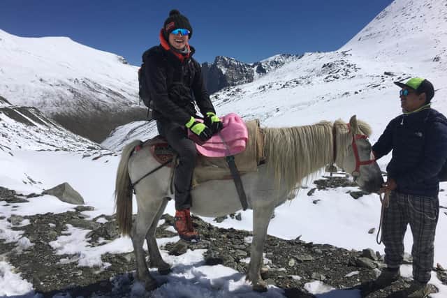 Medical student Christopher Pickles, of the University of Leeds, travels on horseback in remote areas of the Outer Himalayas, to reach sick people, lead by sherpas.