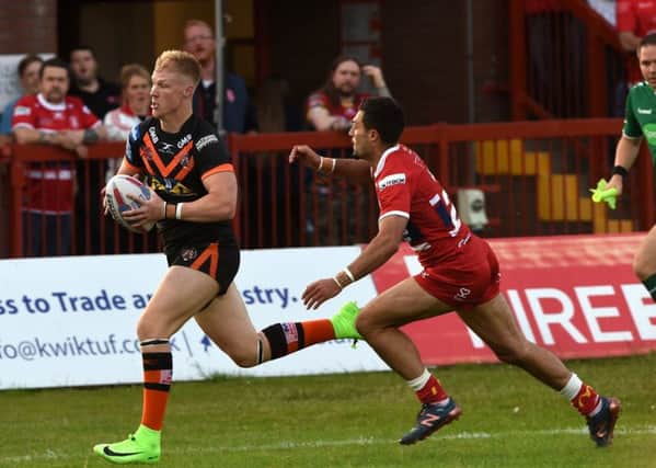 FLYING: Castleford Tigers winger Kieran Gill breaks through out wide. Picture: Matthew Merrick/RL Photos