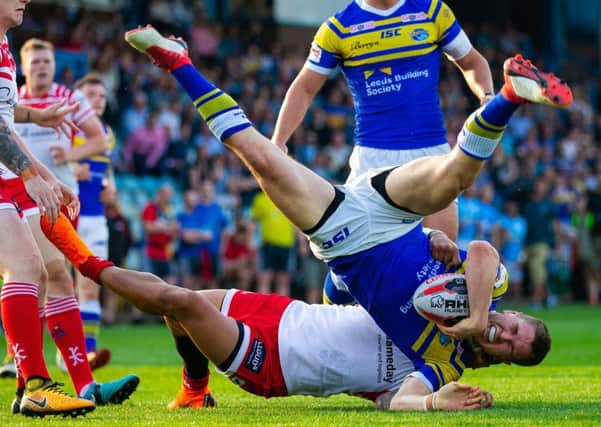Peter Mata'utia-Leifi of Leigh was shown a red card for this dangerous tackle on Leeds' Matt Parcell.