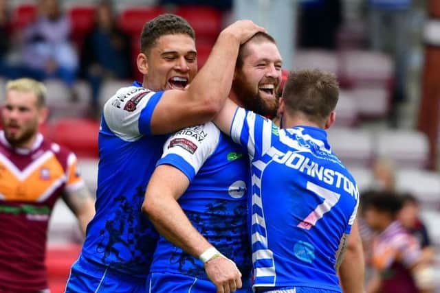 Steve Tyrer celebrates scoring for Halifax.