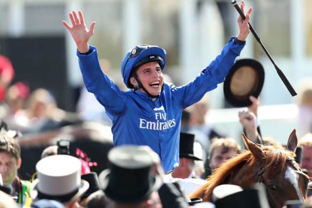William Buick on Masar celebrates winning the Investec Derby. PIC: David Davies/PA Wire