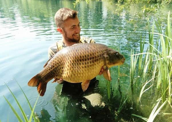 Reece Lyle shows off just a part of his 176lb-winning catch in the latest Bradford No1 carp contest at Knotford.