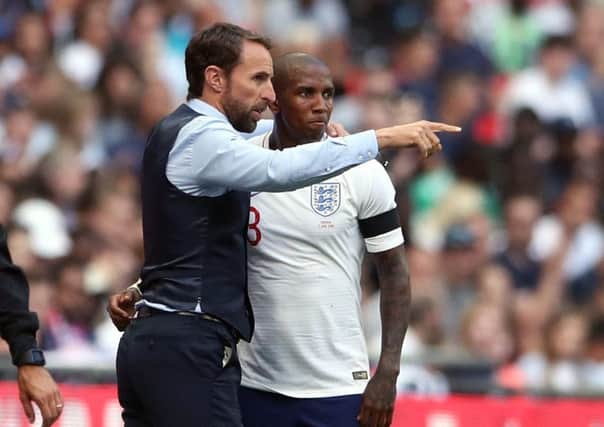 England manager Gareth Southgate and defender Ashley Young.