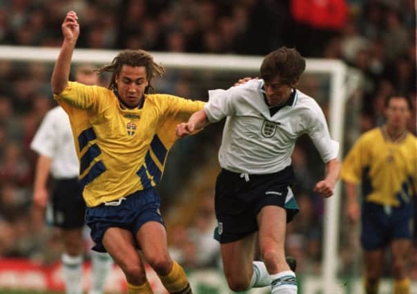 Hero: Darren Anderton, battling with Henrik Larsson, struck late for England. Picture: Chris Cole/Allsport/Getty Images