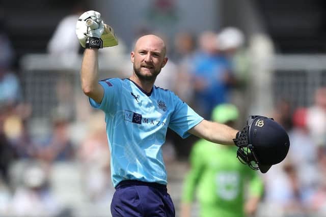 Roses hero: Yorkshire's Adam Lyth celebrates making his century against Lancashire.
