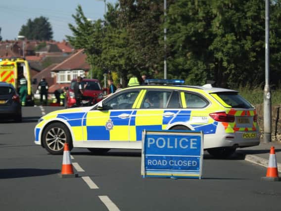 Police at the scene of yesterday's fatal collision. Picture: Matt Sharp.