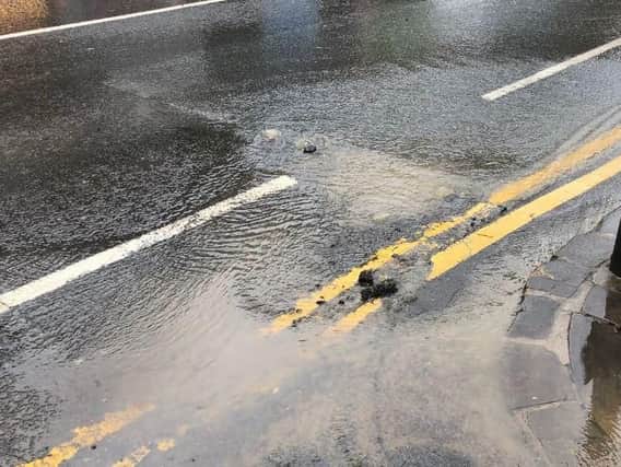 Part of the A660 Otley Road in Headingley has been closed due to damage caused by a burst water main. Picture: Alex Sobel