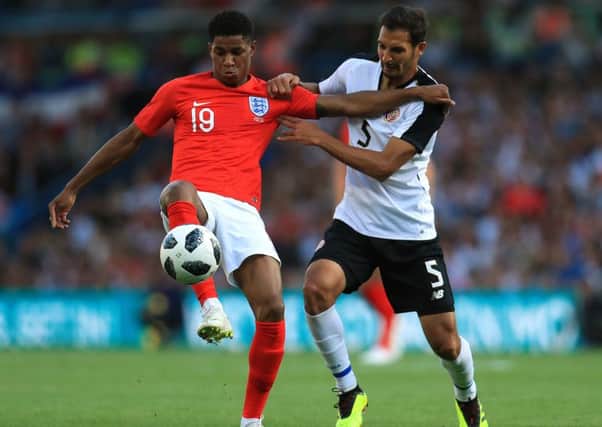 England goalscorer Marcus Rashford (left) and Costa Rica's Celso Borges battle for the ball during the International Friendly match at Elland Road. PIC: Mike Egerton/PA Wire