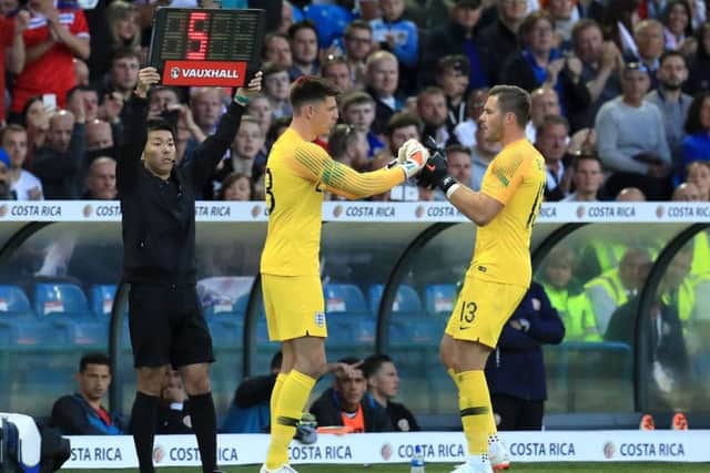 England's Jack Butland (left) is substituted for team-mate Nick Pope during the International Friendly match at Elland Road. PIC: Mike Egerton/PA Wire