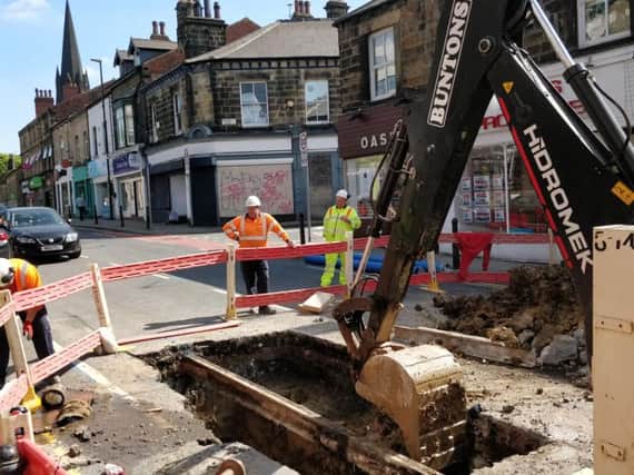 Yorkshire Water teams at work in Otley Road, Headingley, yesterday. Picture: Robyn Vinter